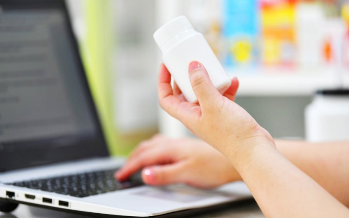 Pharmacist processing medical marijuana at a pharmacy 